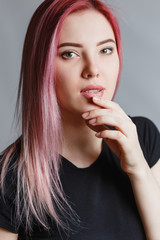 Fototapeta na wymiar Beautiful girl with pink hair