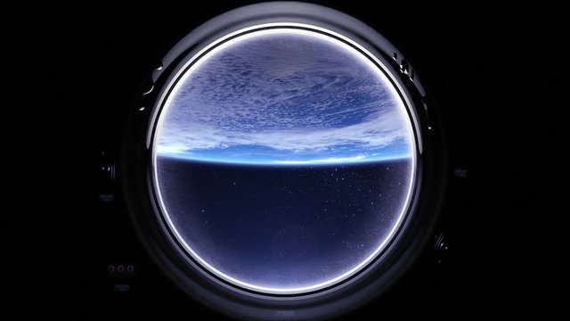Earth as seen through window of International Space Station. International space station is orbiting the Earth. ISS, Space, earth, orbit, ISS.