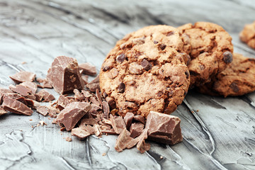 Chocolate cookies on wooden table. Chocolate chip cookies shot