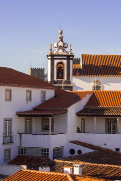 Architecture in Obidos, Portugal, with the tower of Saint Peter's church