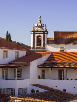 Architecture in Obidos, Portugal, with the tower of Saint Peter's church