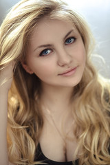 Fototapeta premium Blonde girl with blue eyes