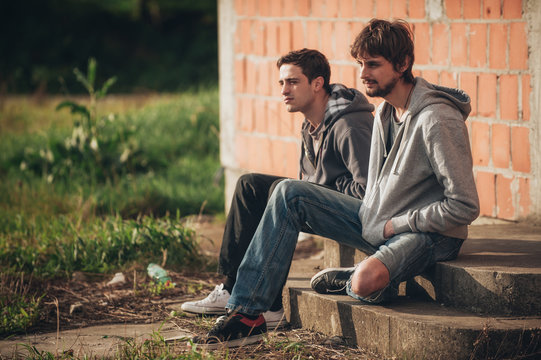 Two Depressed And Sad Young Buddies Friends Thinking About Problems