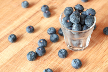 Blueberry on wood background