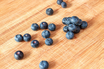 Blueberry on wood background