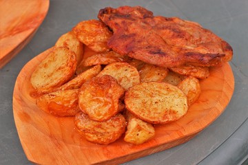 Grilled meat and fried potatoes