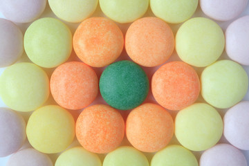 Fototapeta na wymiar Top View of Pastel Colored Round Candies, Close-up for Background, Banner, Texture 