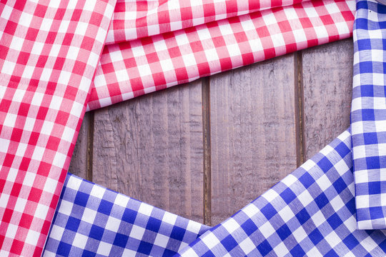 Red And Blue Table Cloth On Wooden Background