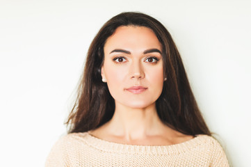 Close up portrait of 35-40 year old woman with black hair