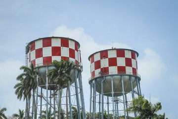 Red and White Checker Water Towers