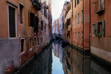 Fototapeta na wymiar Impression of Venice with its beautiful canals, boats and old houses, Italy