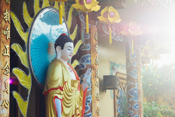 Standing Amitabha Buddha statue on the entrance to Quang Minh Mahayana Buddhism temple in Da Nang, Vietnam