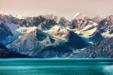 Glacier Bay National Park, Alaska, USA. Alaska cruise travel view of snow capped mountains at...