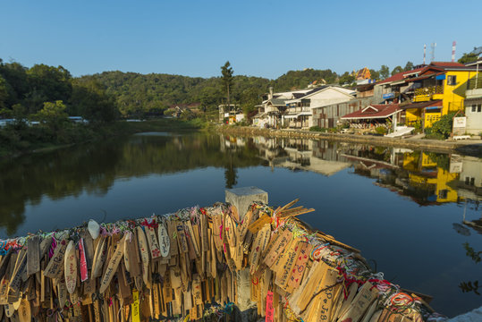 PILOK, KANCHANABURI - February 18 : Old wooden sign fetish with unidentified people write name for good luck and make a wish success on February 18, 2017 at Pilok, Thongphaphum, Kanchanaburi, Thailand