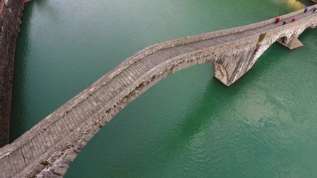 Aerial shot of famous Bridge of Mary Magdalene as known as Bridge of the Devil in Italy, 4K