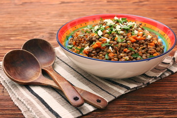 Lentil with carrot and onion in bowl