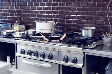 Typical kitchen of a restaurant, toned