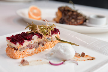 Dressed herring appetizer, Russian cuisine dish, toned