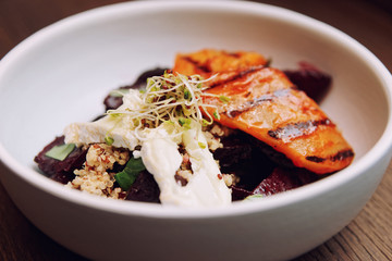 Appetizer of baked beetroot and grilled pear, toned