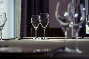 Glasses for wine on the table, selective focusing