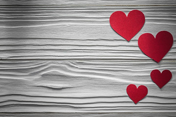 Red hearts on wooden board Valentine cards