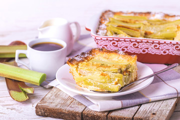 Traditional rhubarb pie with espresso coffee for breakfast.