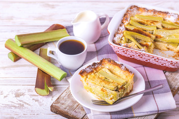 Traditional rhubarb pie with espresso coffee for breakfast.