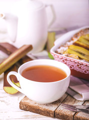 Traditional rhubarb pie with tea for breakfast.