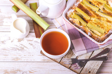 Traditional rhubarb pie with tea for breakfast.