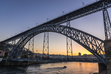 Douro River view Dom Luis I arch bridge connected cities of Porto and Vila Nova de Gaia (left),...