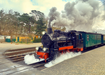 Historical steam train on end station in island Rugen, Germany