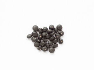 Asparagus seed on white isolated background