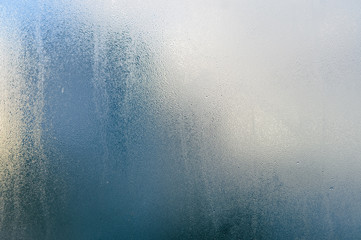 Foggy condensated window blurry textured outdoors background image - obrazy, fototapety, plakaty