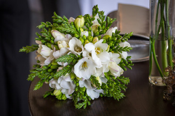 Wedding flowers and glasses of champagne
