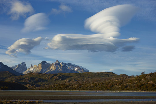 Lenticular clouds over the mountains of Torres del Paine National Park in Patagonia, Chile
