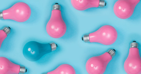 Series of painted pink light bulbs with a one out