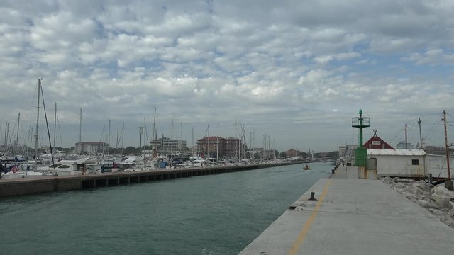 panoramic view of harbor with moored boat