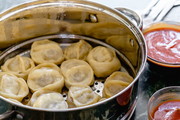 Khinkali, manti, pose, buzi, dumplings - a traditional meat dish of central Asia.