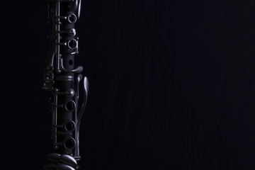 Nice image of a clarinet on a black background.
