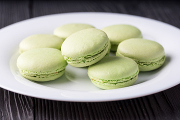 Green colored French macaroons or macarons