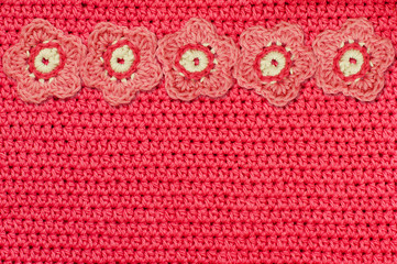 Red crochet fabric and handmade flowers