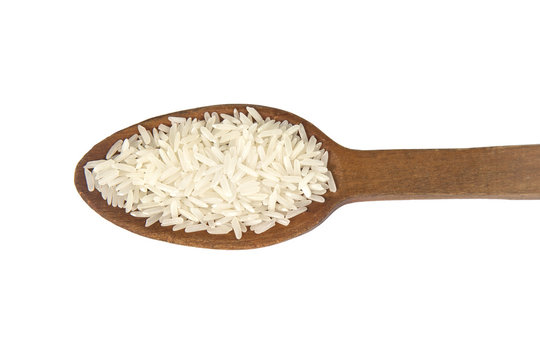 White rice (Thai Jasmine rice) in wooden spoon isolated on white background , clipping path.