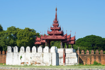 The ancient bastion of the old city close up on a sunny afternoon. Mandalay, Burma