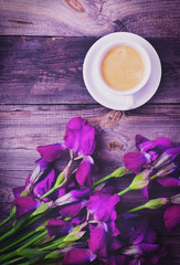 cup of coffee on a gray wooden surface
