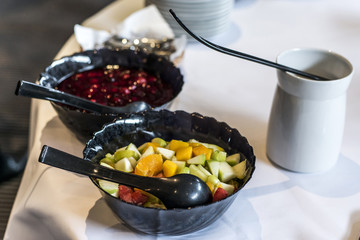 Closeup dessert on buffet table with fresh fruits jelly and cream