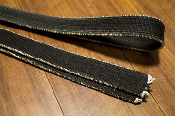 black belt of martial arts on the floor