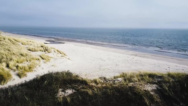  Drone areal shot of the western coastline of denmark spring on the edge of summer with bright sunshine