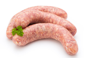 Raw sausage with parsley leaf isolated on white background.