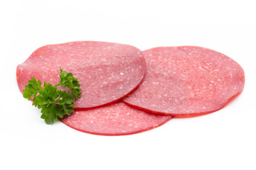 Salami smoked sausage one slice isolated on white background cutout.