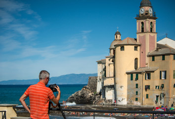 Photographer in Camogli beach, Liguria